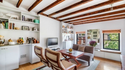 $500K Park Slope brownstone co-op has a roof deck and a kitchen that hides when you’re not using it